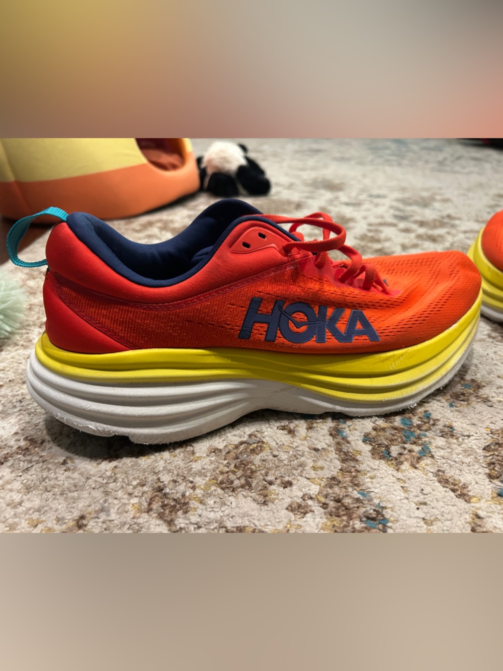 Hoka Orange-Red Sneakers with Yellow Midsole and Navy Logo